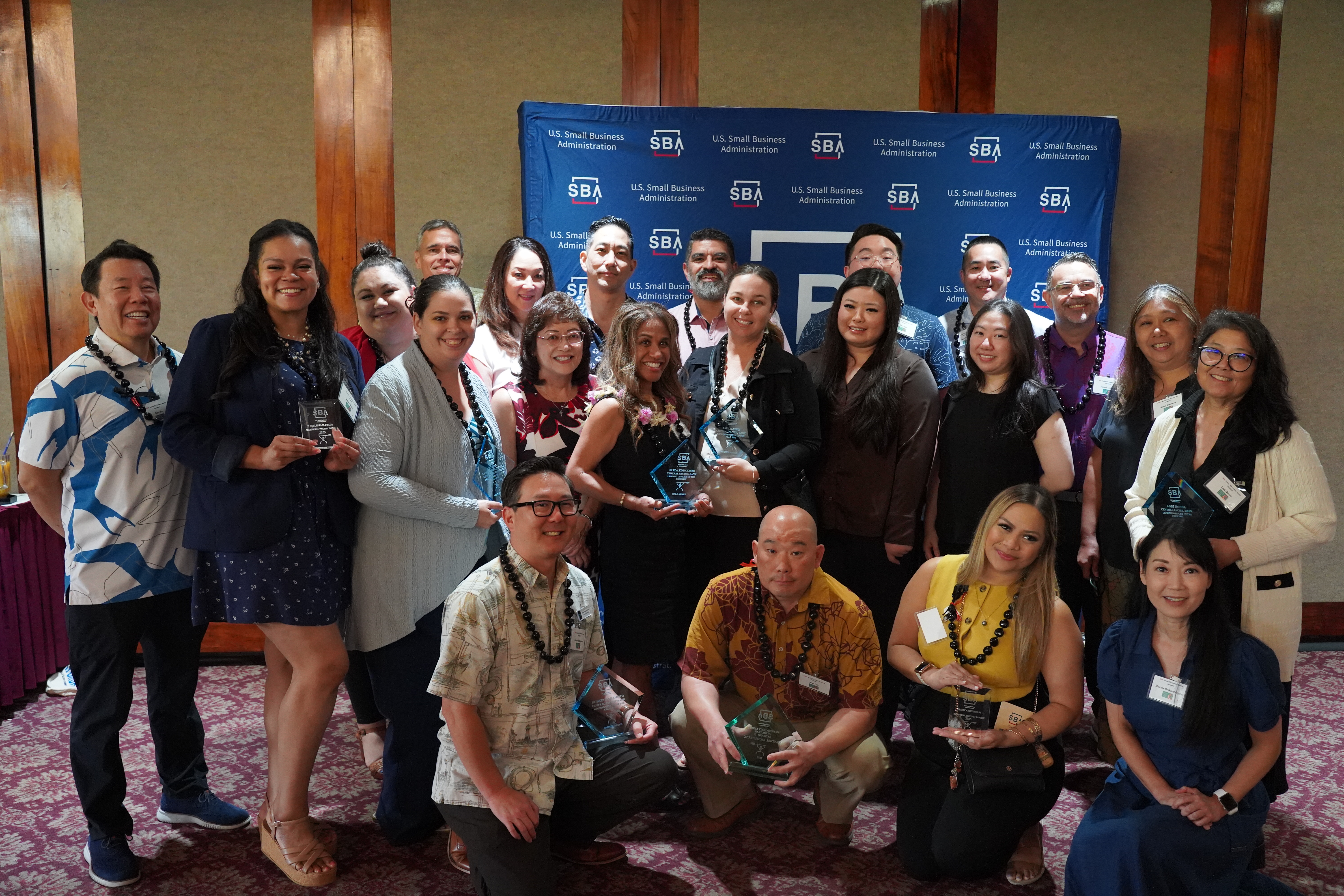 Central Pacific Bank team members celebrating Small Business Administration honors during an SBA awards ceremony.
