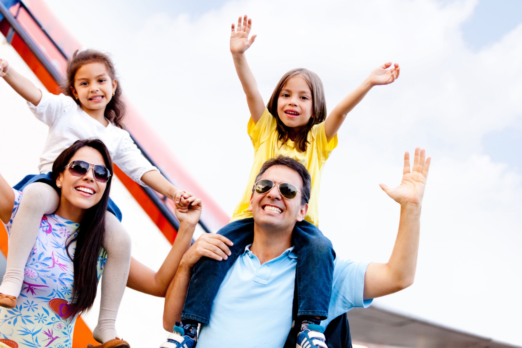 Family enjoying time together outdoors during summer.